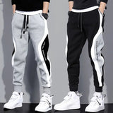 Men's plus size wide loose nine-point sports pants Korean version of the new casual sports student sports tie-foot men's