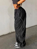 parachute trousers with cargo pockets and piping