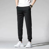 Men's plus size wide loose nine-point sports pants Korean version of the new casual sports student sports tie-foot men's