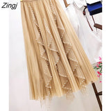 Pearl Pleated Tulle Skirt For Women Autumm Korean Irregular Beaded Wave Cut Elastic High Waist Mesh Pleated