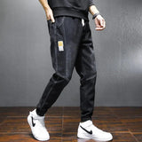 Spring and Autumn New Solid Color Men's Trendy Brand Loose Nine-point Tooling Harlan Casual Tie-feet Men's Patchwork