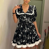 2025 Dopamine Women's Printed Round Collar Long Lotus Leaf Side